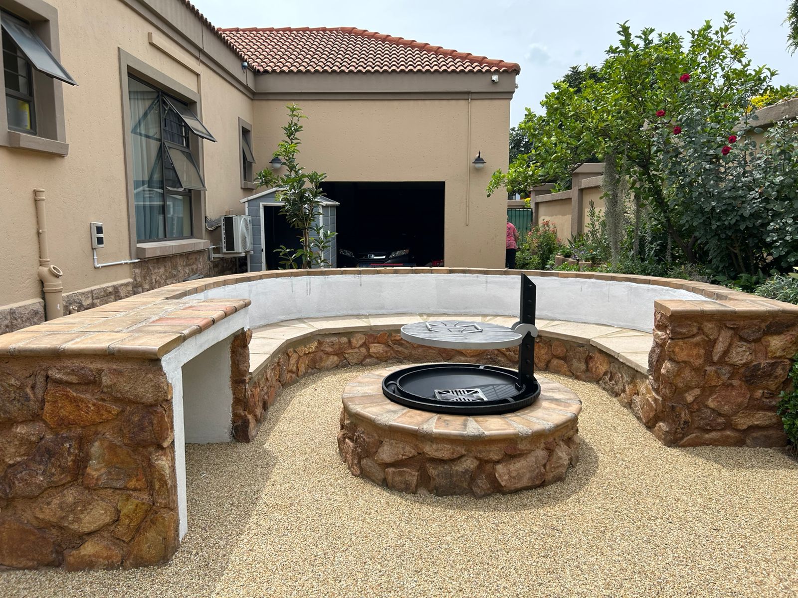 Pebble flooring around a braai area