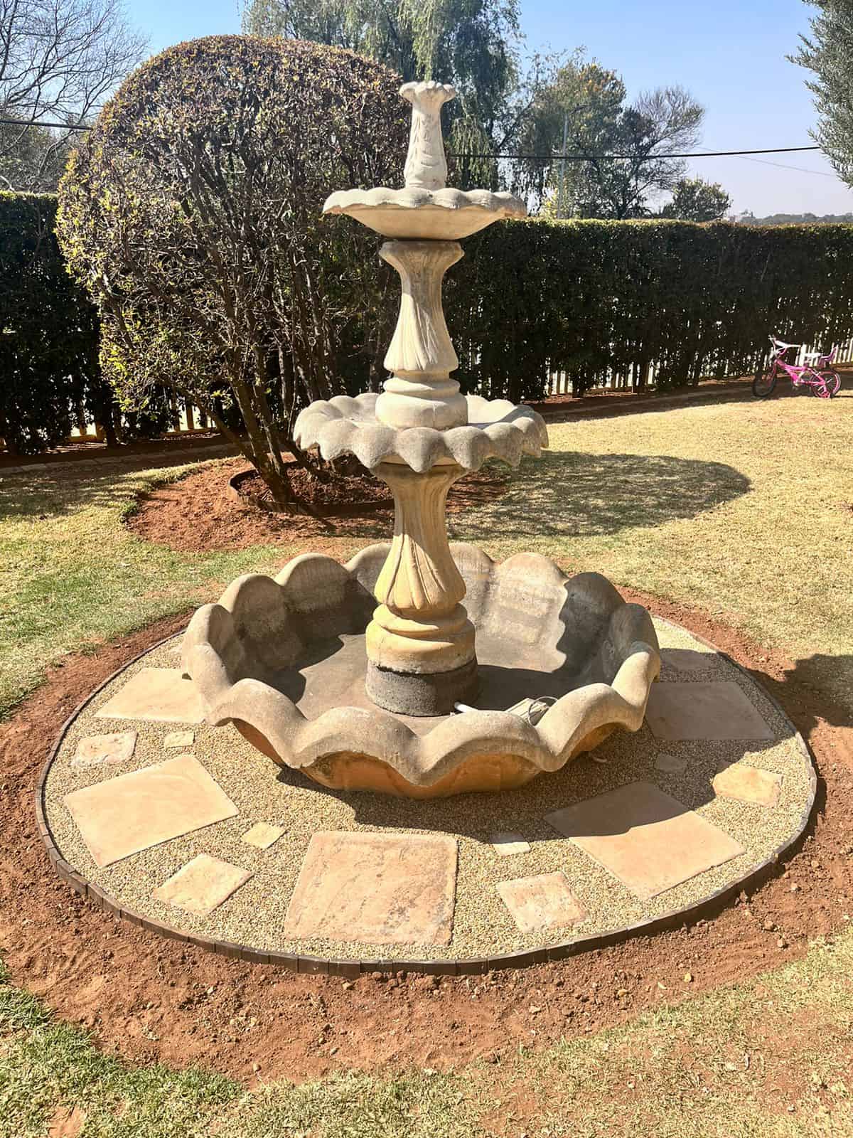 Pebble paving done around a water feature