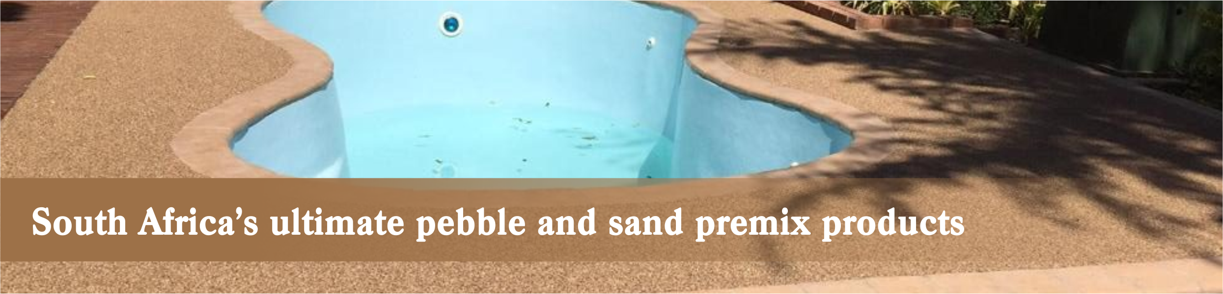 Natural pebbles around a pool